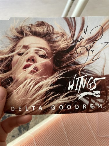 Delta goodrem wings signed - delta,